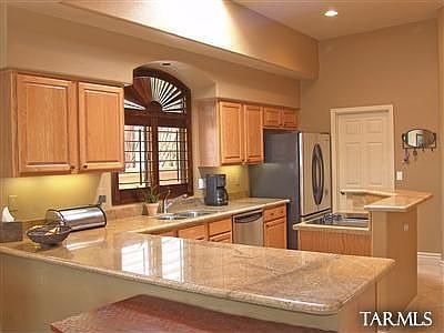 Kitchen has granite countertops