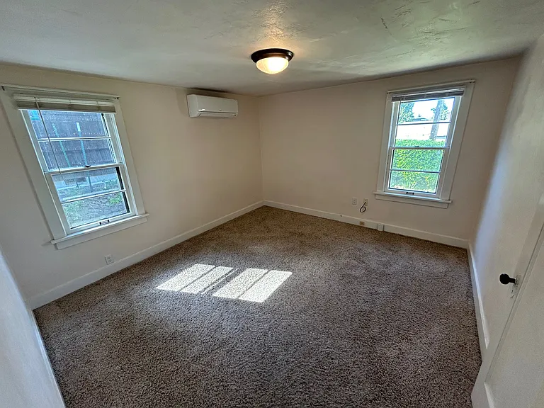 Larger north bedroom with heat pump & AC.