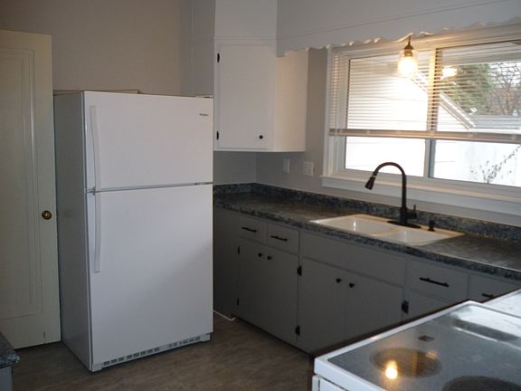 Updated kitchen, electric glass top range, disposal, and lots of cabinet space.
