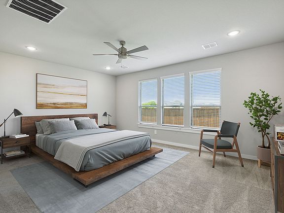 Primary Suite in the Henley home plan by Trophy Signature Homes - REPRESENTATIVE PHOTO