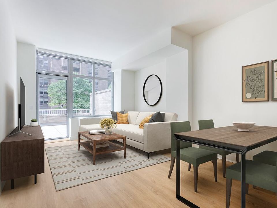 Renovated Package I living and dining area with hard surface flooring