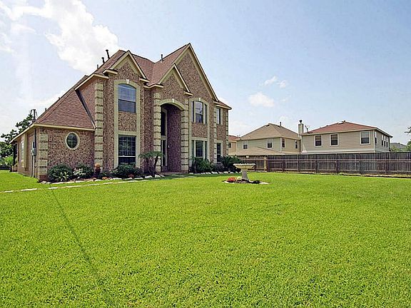 Beautiful home with 4 bedrooms, 3.5 baths & 3 car detached garage.