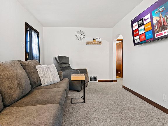 Living room with Smart TV with Roku for streaming