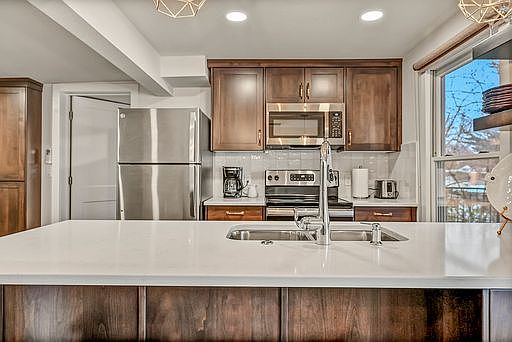 Full size kitchen with pots, pans, dishes, silverware, etc. Ready to cook!