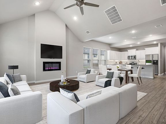 Open first floor in the Stanley home plan by Trophy Signature Homes - REPRESENTATIVE PHOTO