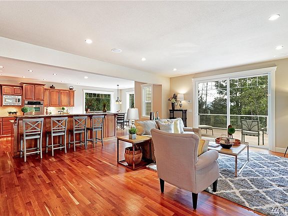 Open concept Family and kitchen with breakfast bar and Nook