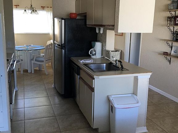 5th image of 514 Beach Park Ln Unit 216