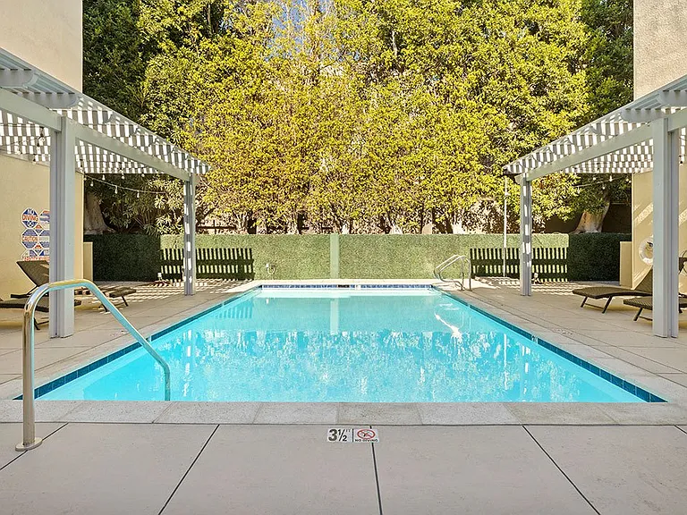 Courtyard pool at Palms Court Apartments