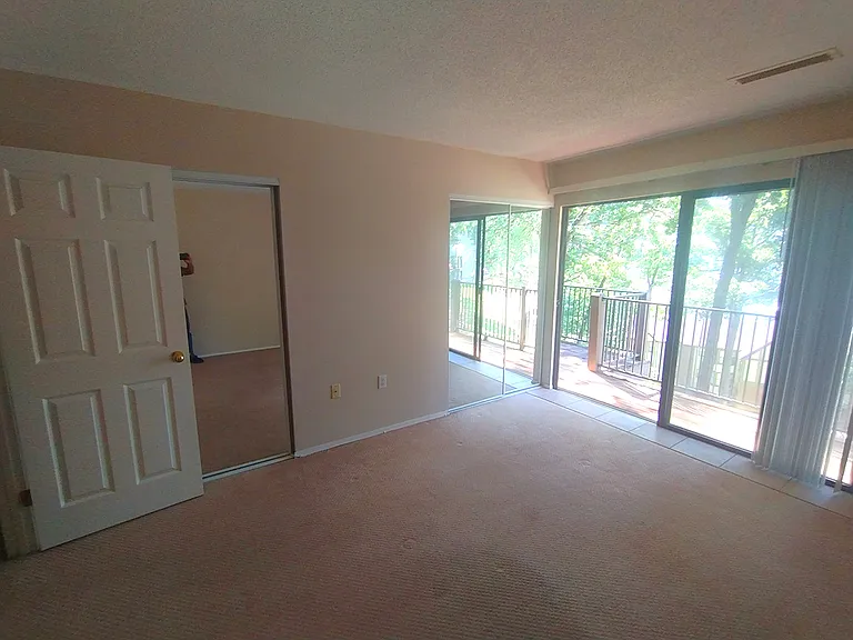 Bedroom with two double closets