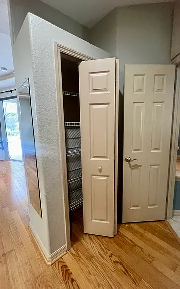 Primary bedroom linen closet or secondary closet