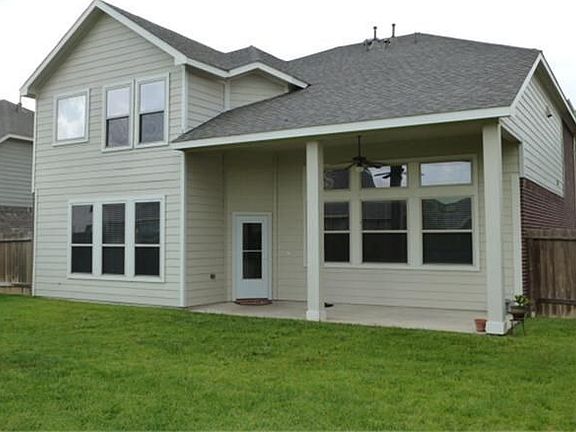 Rear elevation shows low maintenance cement board exterior.
