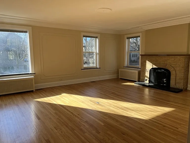 Living room with wood-burning fireplace