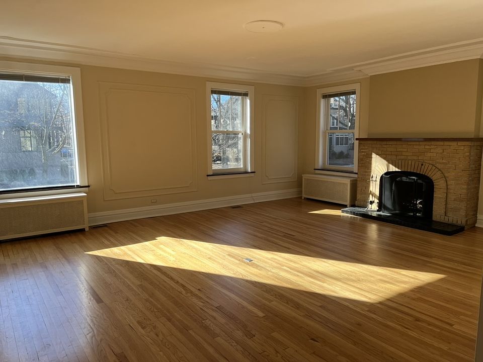 Living room with wood-burning fireplace