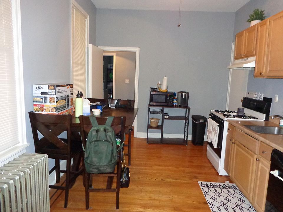 Kitchen with furniture before new cabinets and new appliances