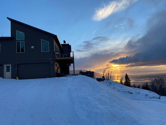 Apartment is on the bottom floor with 2-car garage, private deck and storage area. Professional snow removal in winter.