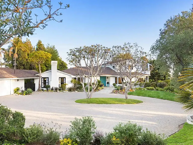 Large circular driveway past the entry gate.