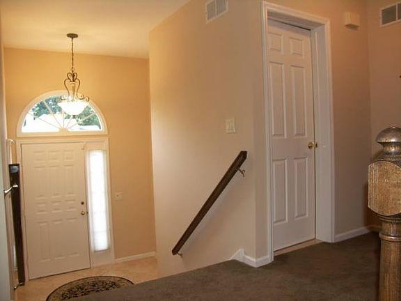 Foyer w/ Travertine Tile