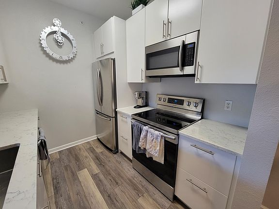 Brand new kitchen with stainless steel appliances