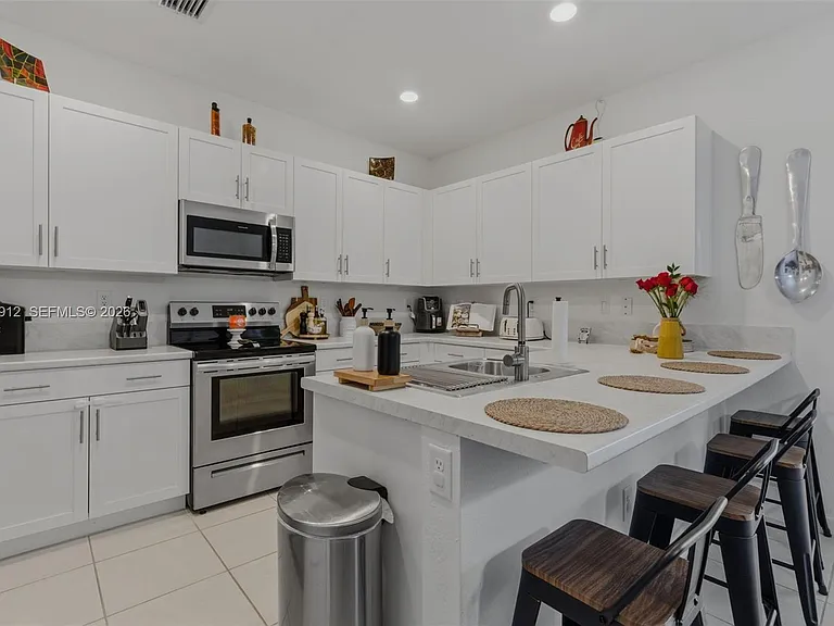 10009 SW 228th Ter — Photo 1