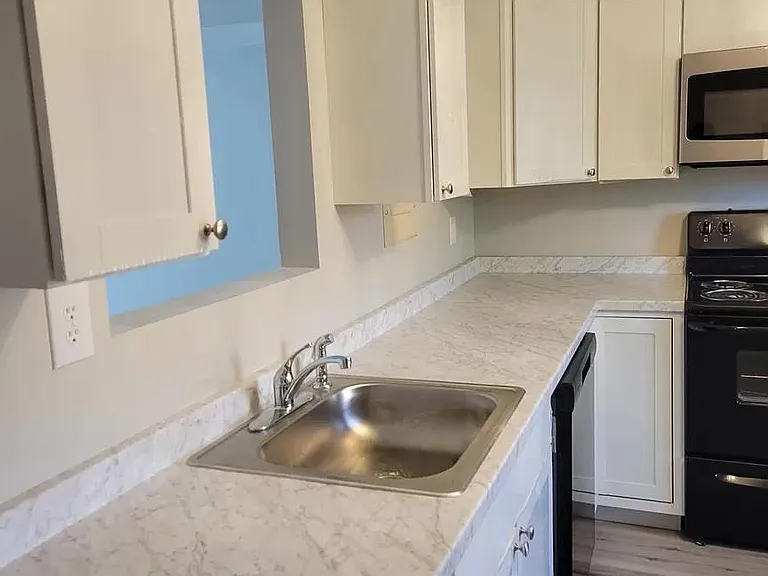 Renovated kitchen, new countertops, new cabinets, new appliances