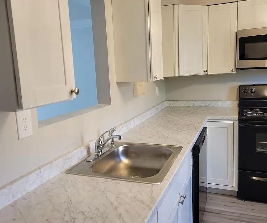 Renovated kitchen, new countertops, new cabinets, new appliances
