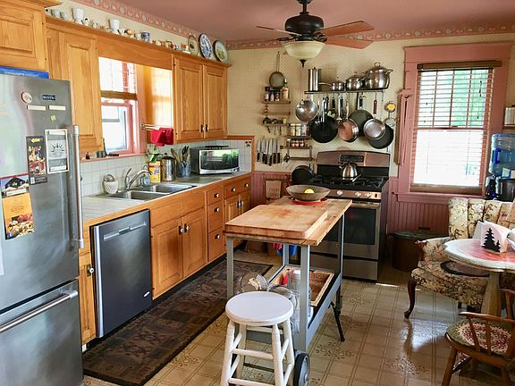 Stainless steel appliances ~ including a gas cook stove with grill.