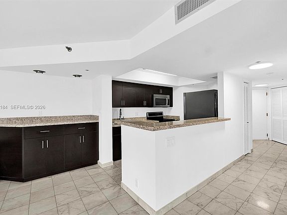 5th image of 300 Three Islands Blvd APT 305