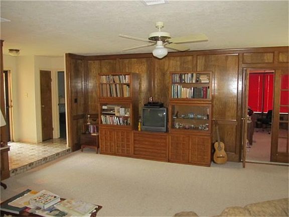 Family room with view of study on right hand side, master on left