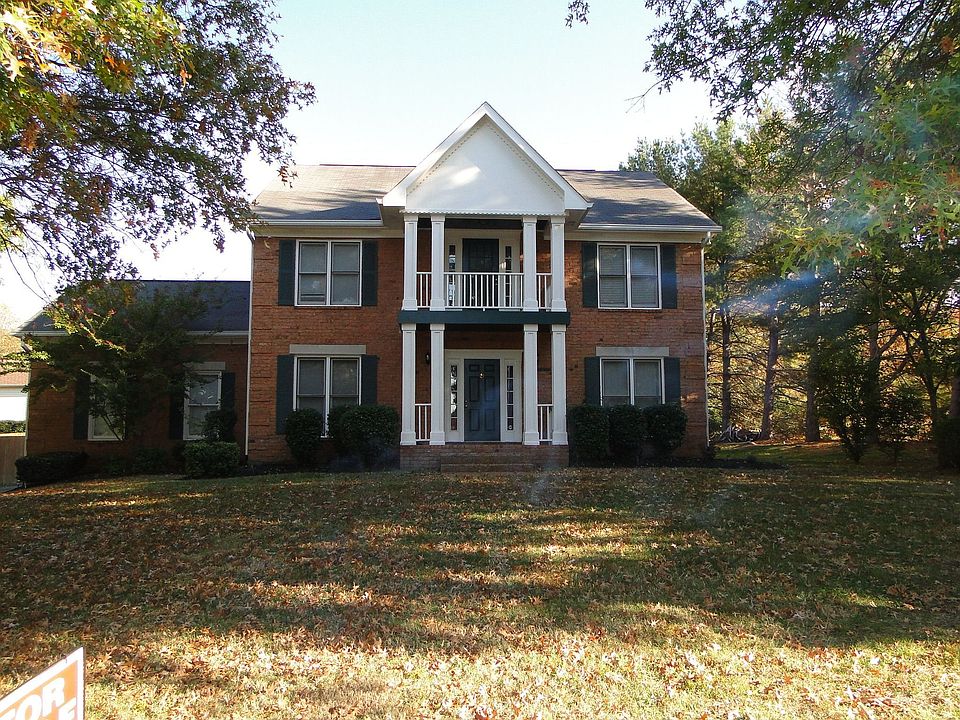 Front of house with double front porch.