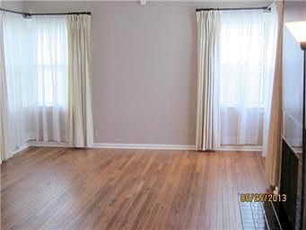 Formal Living Room with Lovely Fireplace