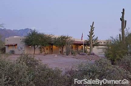 Front Elevation
						:
						Drive leading up to the home.