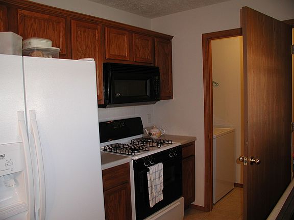 Whirlpool side x side fridge, washer and dryer