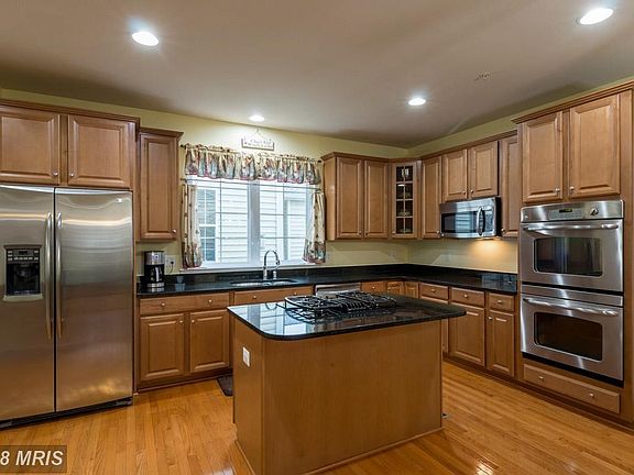 Gourmet kitchen with island.