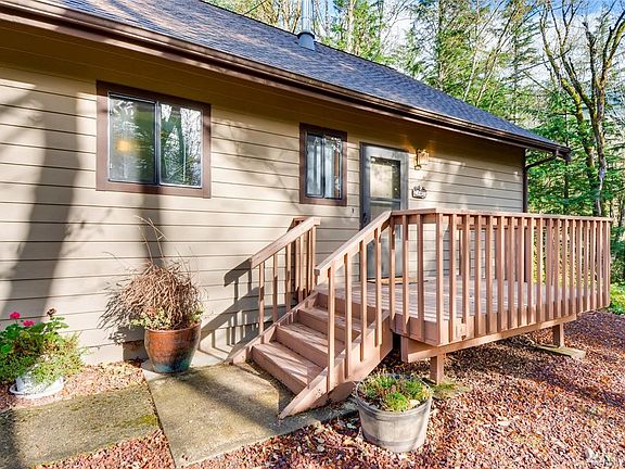 Here's the porch entry to your new home.  Newer roof and gutters and warranty will transfer to new owners.