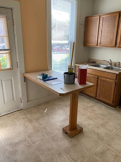 Kitchen: Private entry from back parking area