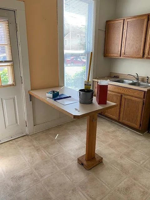 Kitchen: Private entry from back parking area