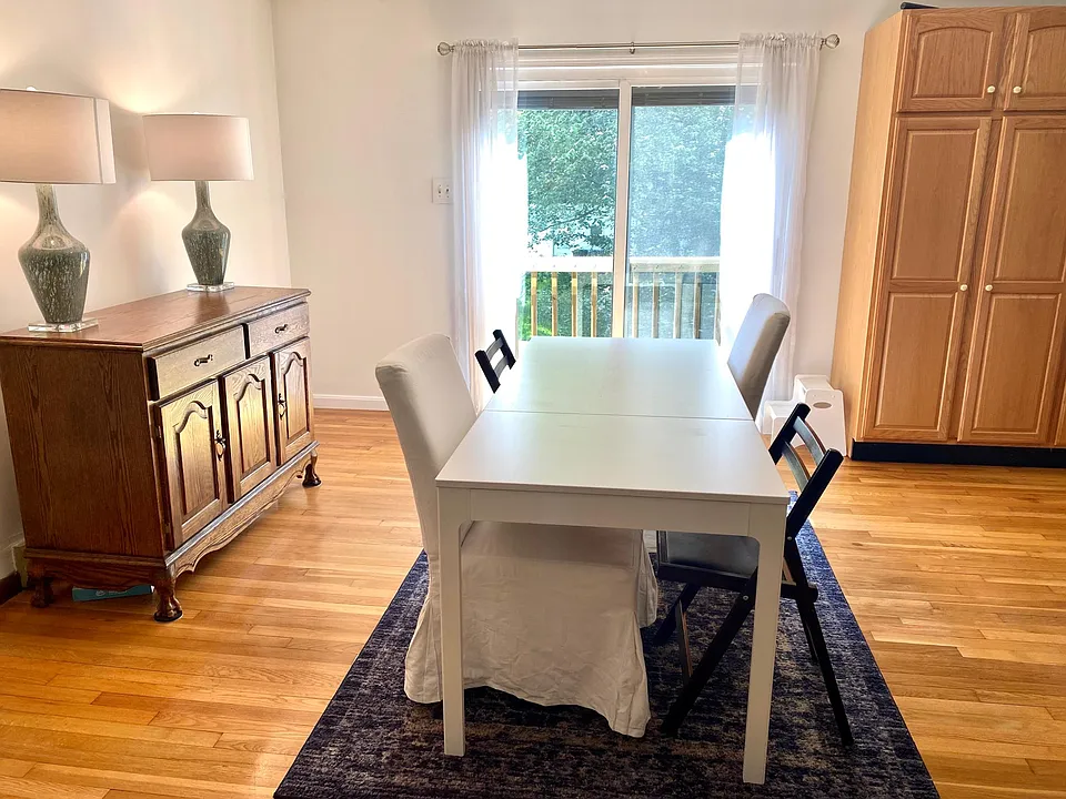 Upper level dining open to kitchen and living.