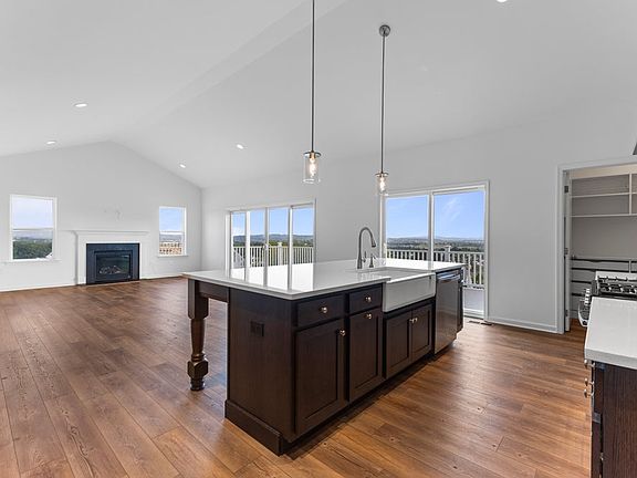 Rockford Great Room with Optional Fireplace Window Package, Added Sliding Glass Doors, and Extended