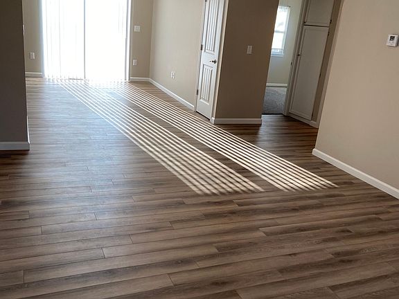 Front door view of living/dining