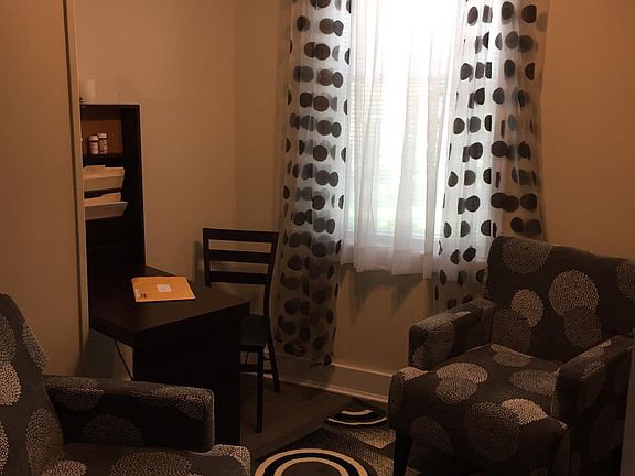 Sitting room with fold down desk