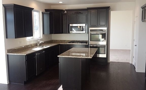 Interior pictures are of a similar home