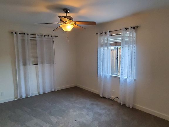 Bedroom 1 showing windows on 2 walls