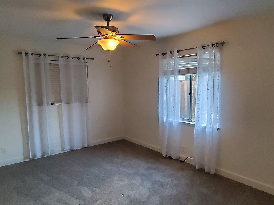 Bedroom 1 showing windows on 2 walls