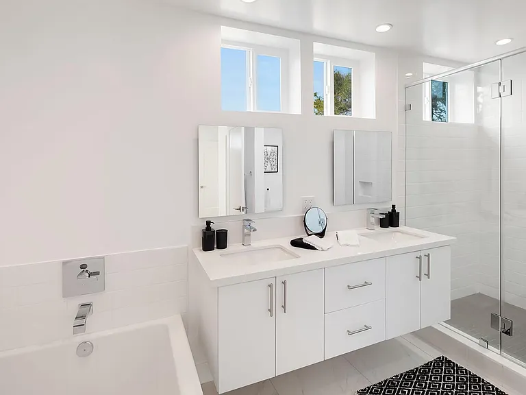 Primary bathroom (with tub, shower, dual vanity).