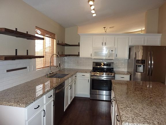 Kitchen with stainless steel appliances