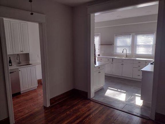 Kitchen, Pantry, Quartz countertops, dishwasher, refrigerator. Sink for washing and sink for cooking.