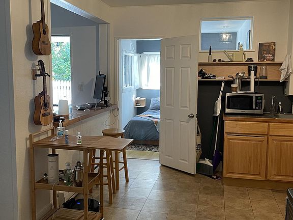 Kitchen looking into bedroom