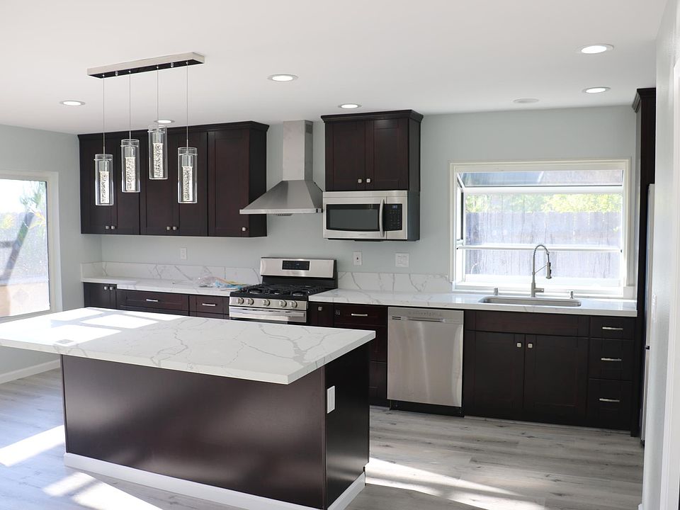 Fully remodeled kitchen with island.