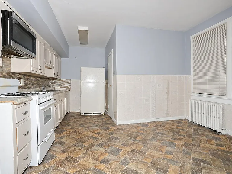 Large kitchen with full bathroom