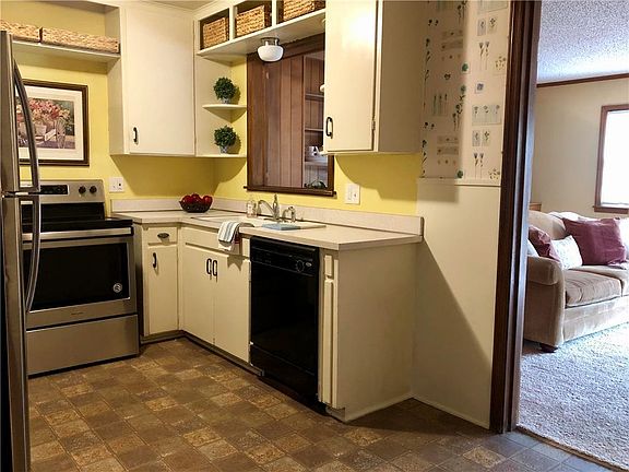 Kitchen opens to Family Room and Dining Room